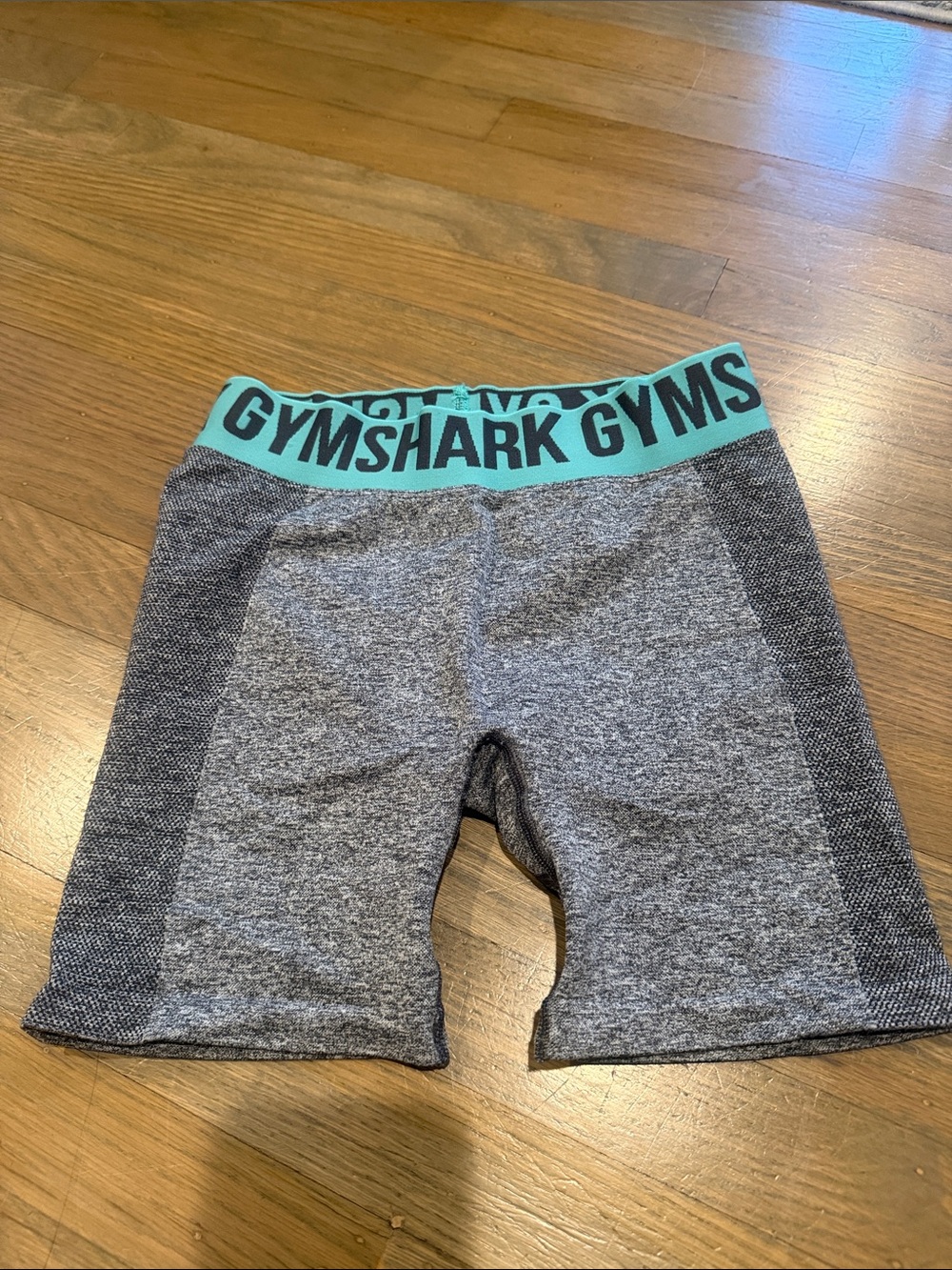Gymshark Women's Gray Seamless Bike Shorts with Teal Logo Waistband